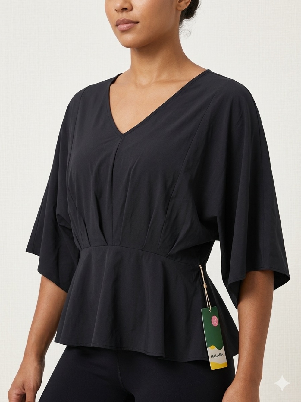 64. HALARA Black V-Neck Peplum Tunic Top